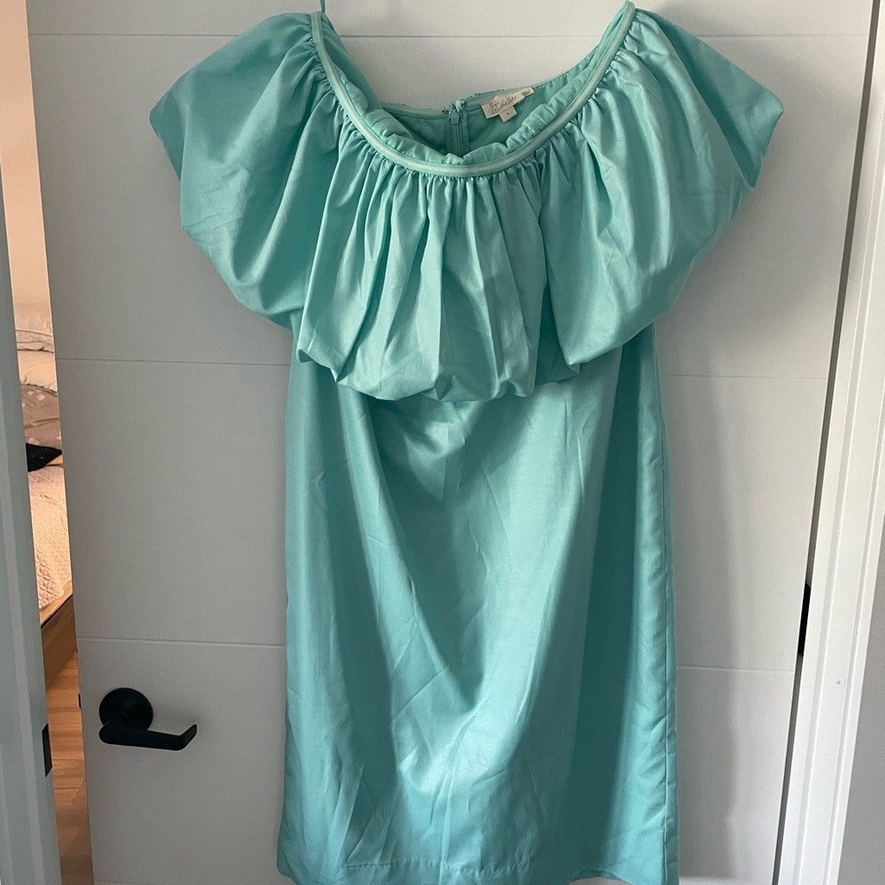 Woman aqua color dress